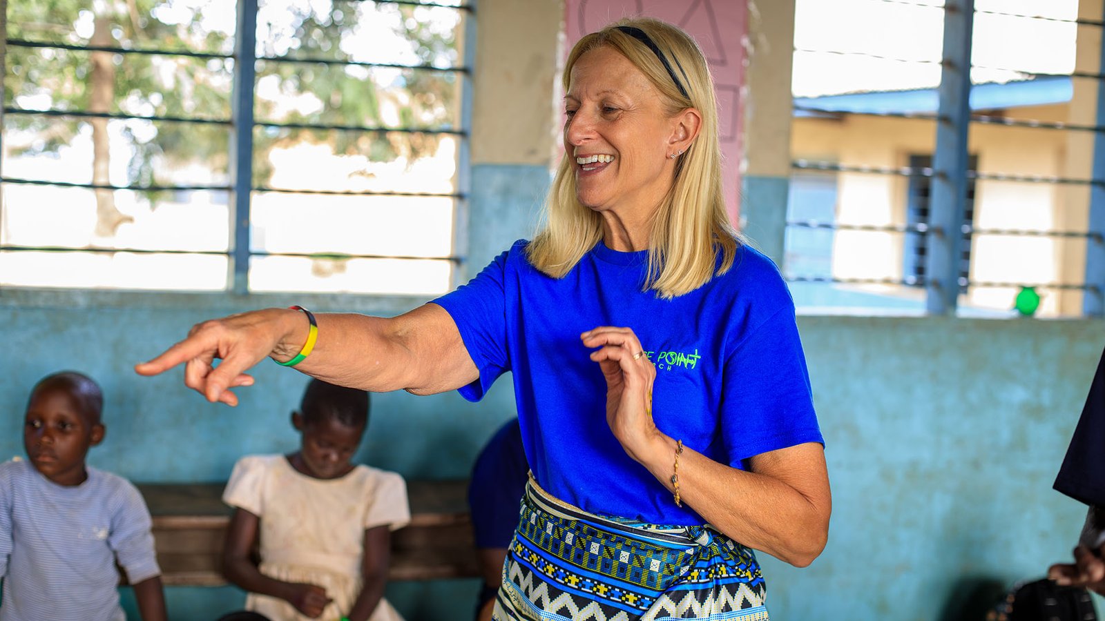 Mrs Kim Messamore teaching the children